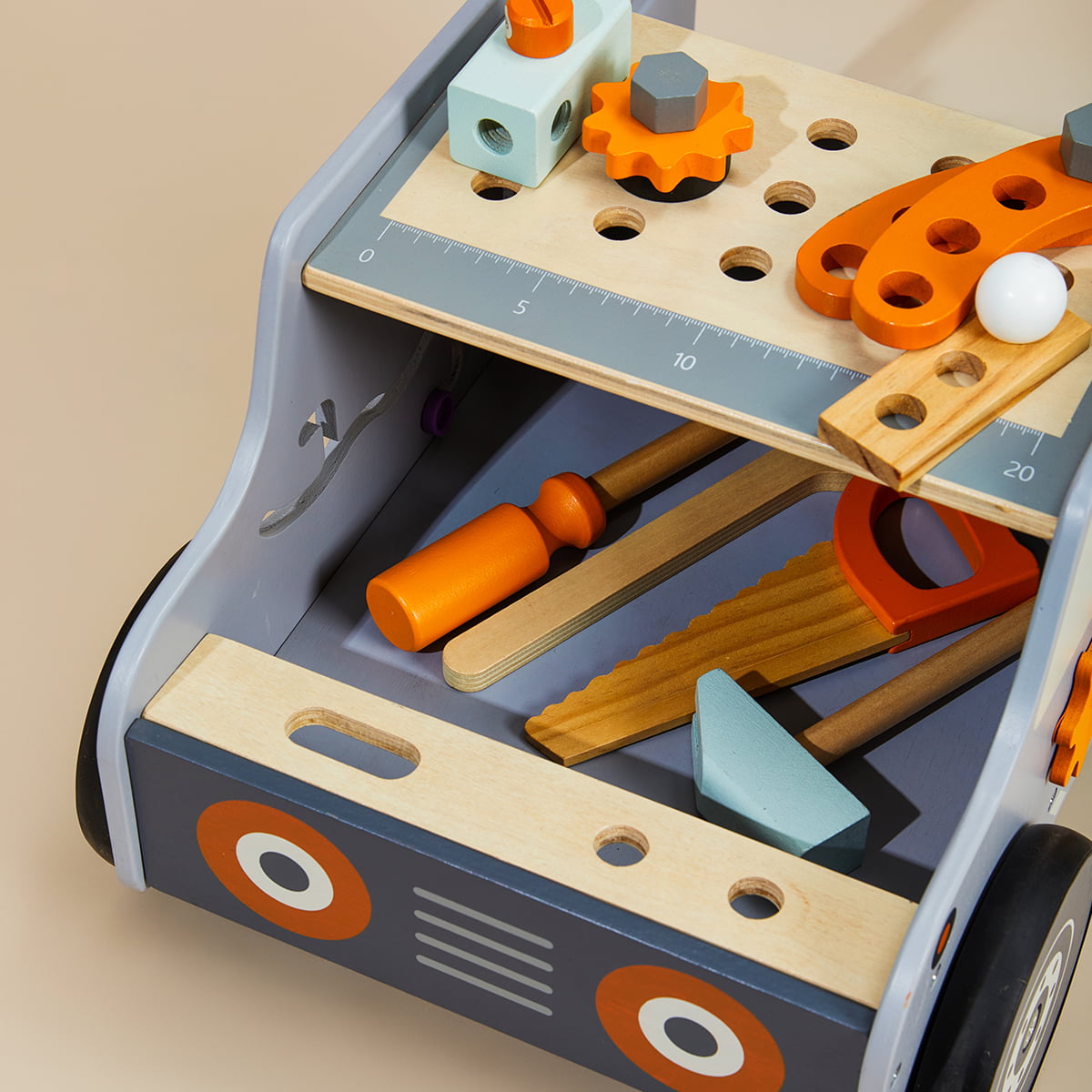 Tool bench walker with toy tools, ruler and building accessories