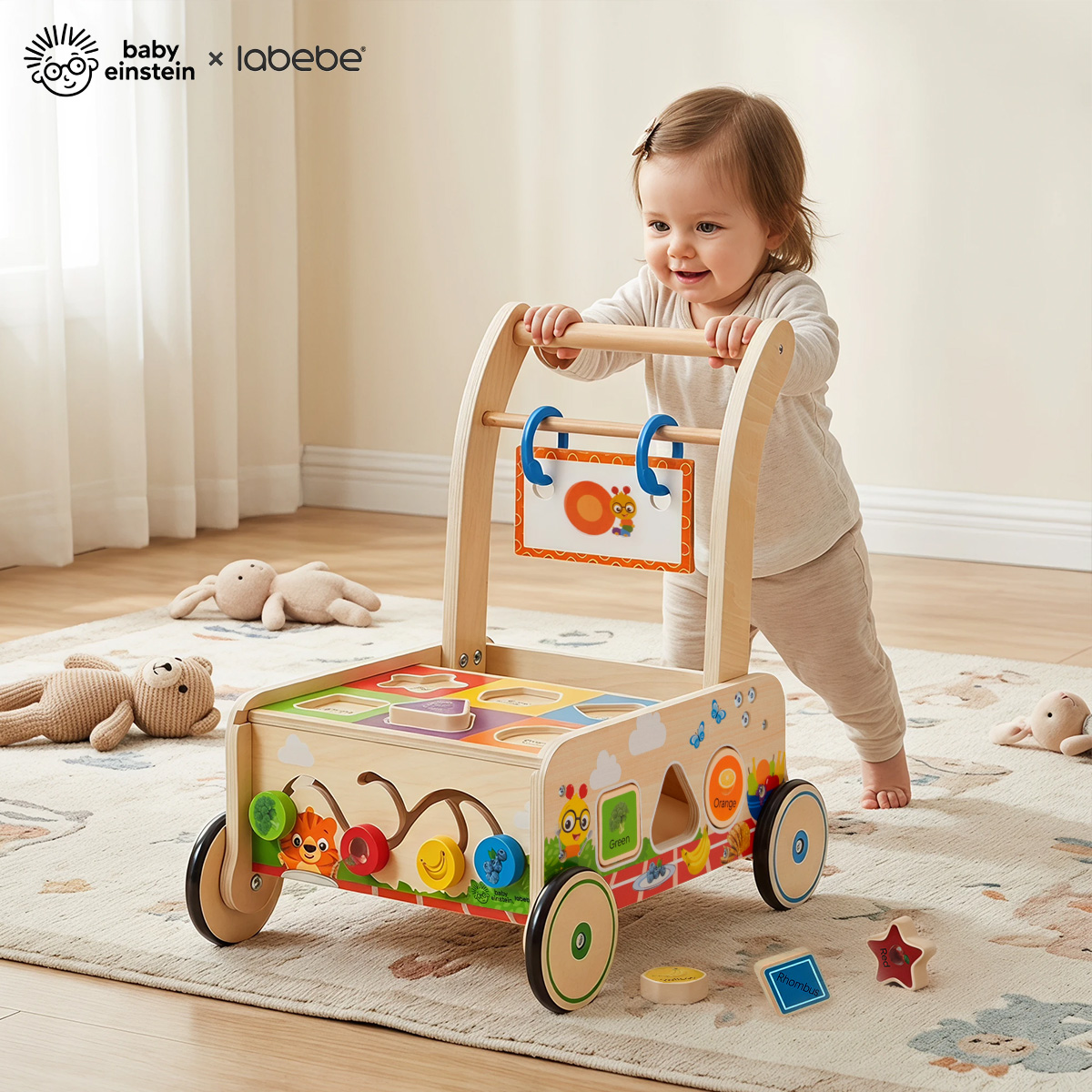 Toddler pushing Baby Einstein x labebe wooden push walker while learning to walk