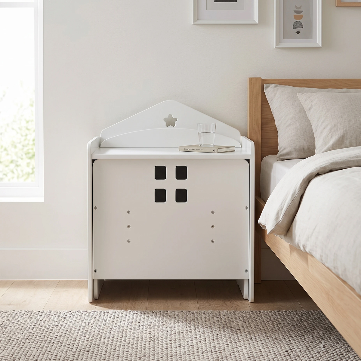 Space-saving white toddler table and chair set beside kids bed