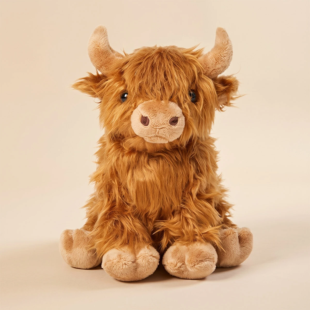 Labebe fluffy brown highland cow plush stuffed animal sitting front view