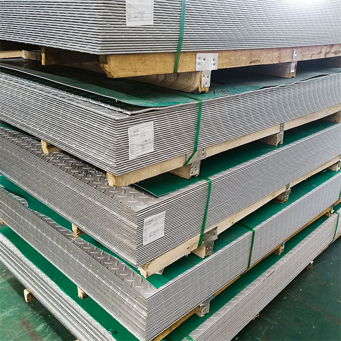 stainless steel patterned plate ASTM certification label stacked in warehouse